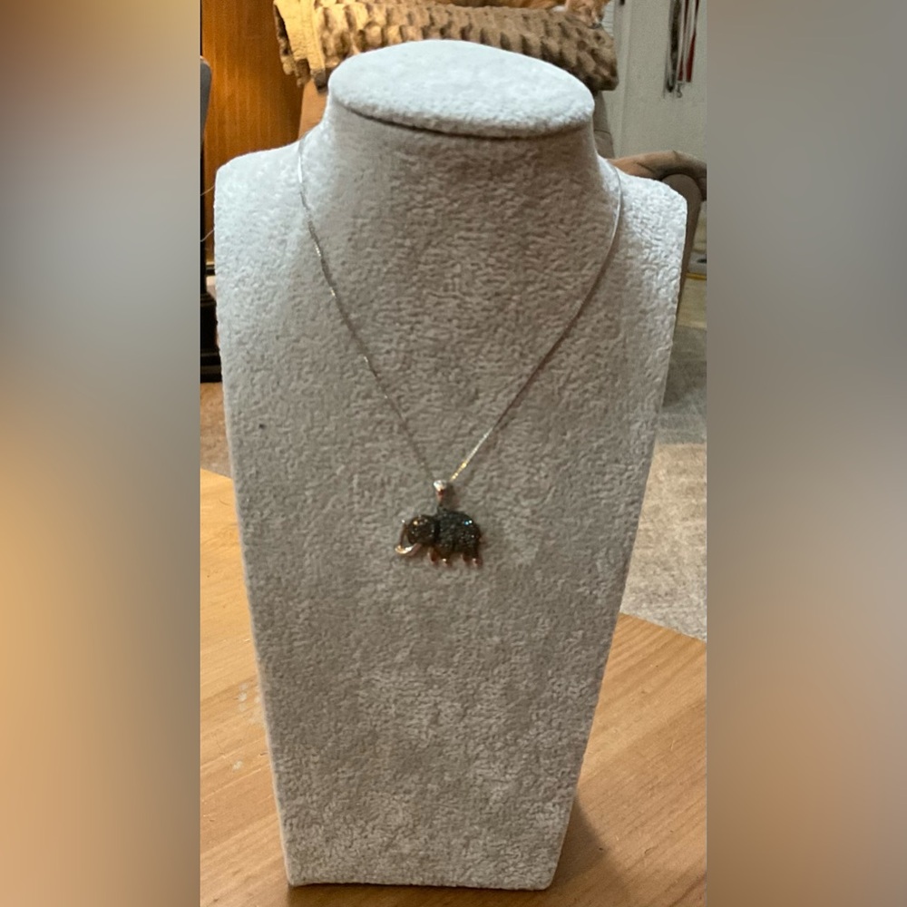 Ross- Simon’s: blue diamond elephant sterling silver pendant and necklace set.